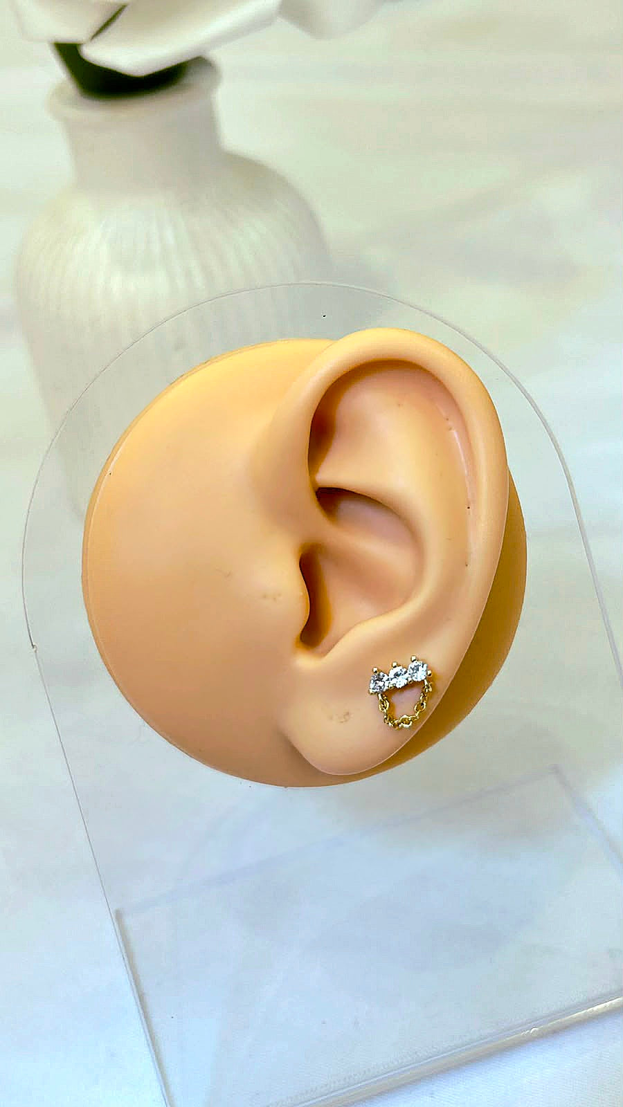 Dangling Crystal Chain Piercing