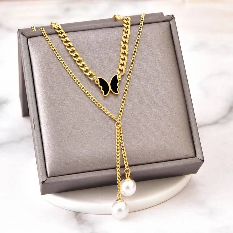 Black Butterfly and Pearl Chain