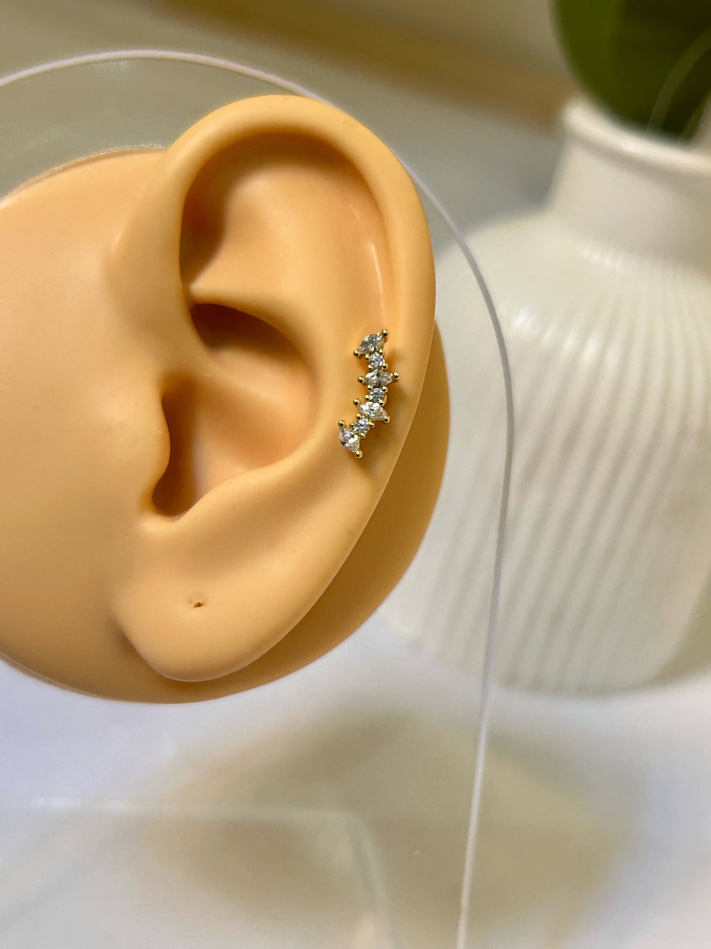 Sparkling Curved Cluster Piercing